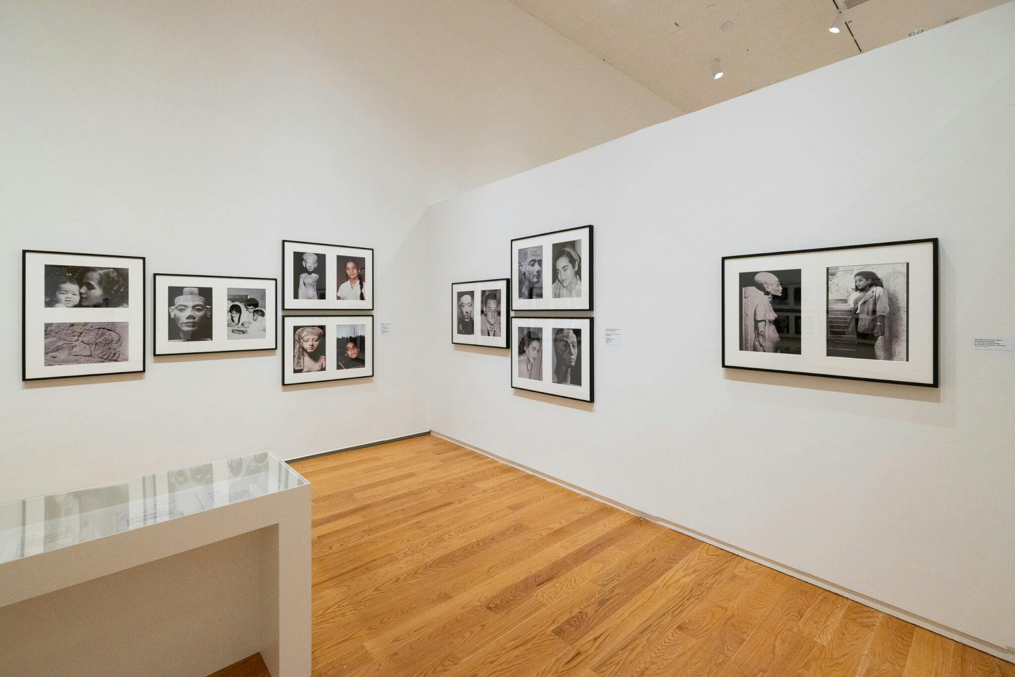 Photographs by Lorraine O'Grady adorn the white walls of a gallery.